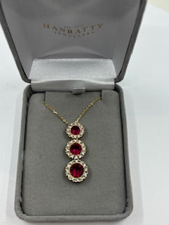 Trilogy Ruby CZ Pendant - 9ct Yellow Gold